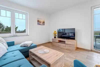 Image de Welcome to the vacation apartment \"Achterwasserblick 1\" in the Baltic seaside resort of Loddin.