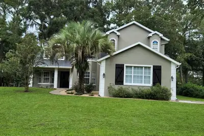 Image de Fully renovated, 4-bedroom 3. 5 bath - 3 minutes to Wec in peaceful neighborhood