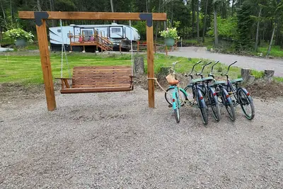 Image de Vacation Camper with private area behind with Seating, Firepit, and Hot tub