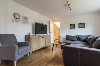 Image de Appartement 'Wattkieker' avec terrasse privée, jardin partagé et Wi-Fi