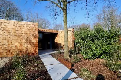 Image de Design holiday home on estate Bergvliet with hot tub in the Brabant forests between Breda and Oosterhout.