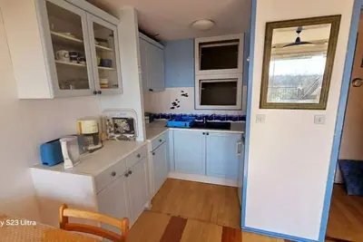Image de Appartement 4 personnes vue sur un parc arboré