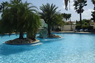 Image de Cozy studio in resort Seru Coral in Curacao with communal pool.
