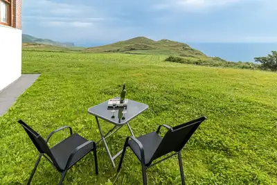 Image de Appartement \"Gloria-Patchwork\" avec vue sur la mer, jardin partagé et Wi-Fi