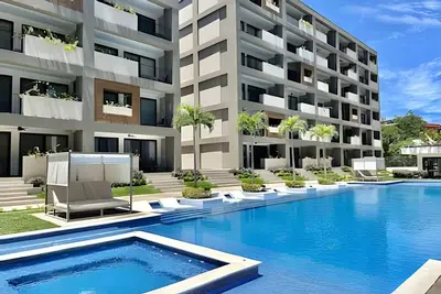 Image de Coastal condo w/ pool & elevator access