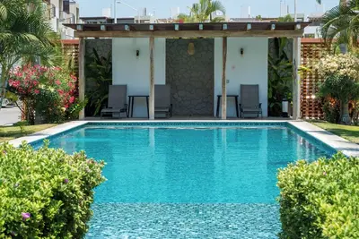 Image de Cozy apartment in Manzanillo 5min from the beach, great location family-friendly