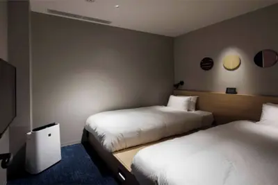 Image de Cloud-Level Bunk Room Escape in Affordable Hotel WiFi Ac Gym laundromat Shinjuku