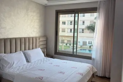 Image de \n\n“Sunny 2br Apartment in Bouznika – 2 min to Beach, A/C, WiFi, Family-Friendly”