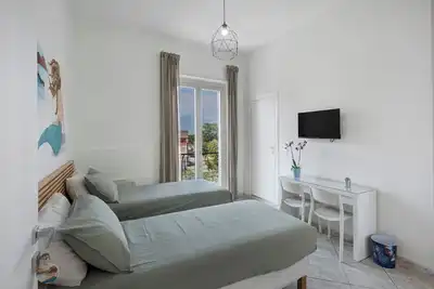 Image de Chambre \"Napoli\" avec terrasse partagée, Wi-Fi et climatisation