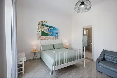 Image de Chambre 'Camera Tripla Costiera' avec Terrasse partagée, Wi-Fi et Climatisation