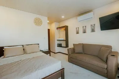 Image de Quadruple room 4 with garden view