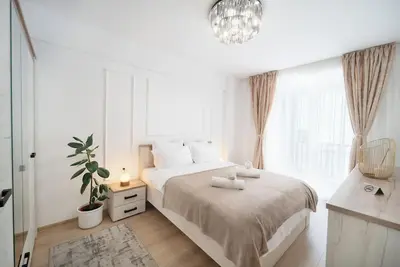 Image de Modern Apartment with Free Private Parking in Timisoara