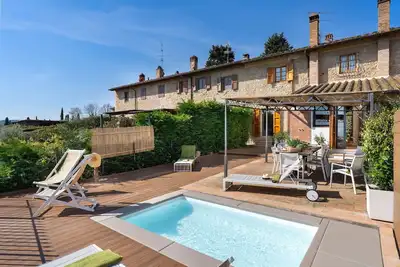Image de Maison de vacances privée avec Wifi, bain à remous, piscine, climatisation, Tv, patio
