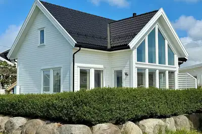 Image de Maison de vacances de 4 chambres près de la mer