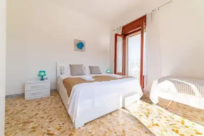 Image de Villetta Pina 50 metri da spiaggia sabbia + parcheggio