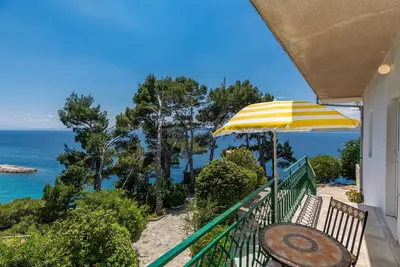Image de Appartement de trois chambres avec le balcon et la vue sur le mer Brela, Makarska (A-2713-a)