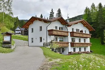 Image de Appartement 'Obermüllerhof 2' avec vue sur les montagnes, jardin partagé et Wi-Fi