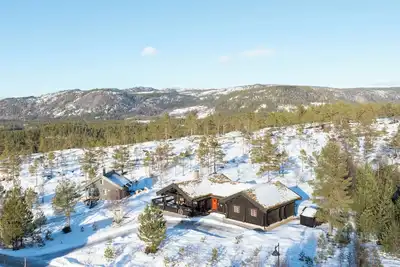 Image de Beautiful log cabin, 4 bedrooms with sleeping space for 12, free wifi and sauna