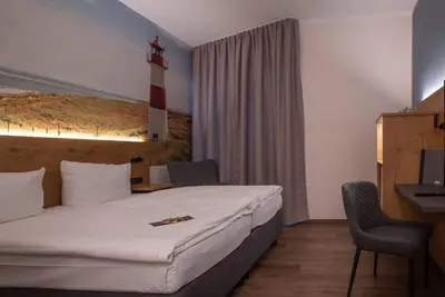 Image de Double room, shower, Wc, Superior - Hotel Stadt Aurich