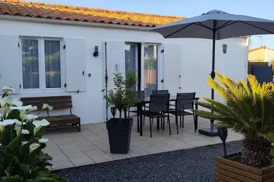 Image de Maison dans résidence sécurisée avec piscine partagée