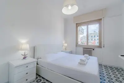 Image de Comfortable apartment of about 60 sqm, able to accommodate 4 people, located on the third floor of a building with a lift. The property is located in a central and well-served area of ​​Rapallo, a few steps from the train station and close to the main