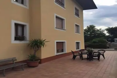Image de Appartement \"Arancio\" avec vue sur les montagnes, terrasse privée et Wi-Fi