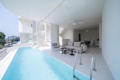 Image de 5km to beach – pool villa with slide, karaoke & kitchen, perfect for family fun.