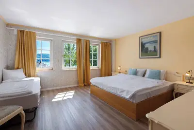 Image de Chambre '3-Bett Mit Seeblick' avec vue sur lac, terrasse partagée et Wi-Fi