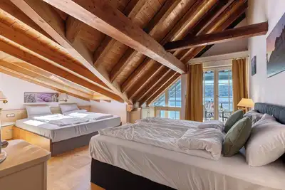 Image de Chambre 'Suite Mit Seeblick U Balkon' avec vue sur lac, terrasse partagée et Wi-Fi