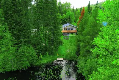 Image de Le Chalet Blanc, lakefront with jacuzzi