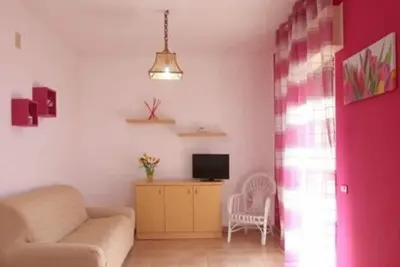 Image de Appartement 'Le Magnolie 15 - 2° Piano' avec vue sur la mer, Wi-Fi et climatisation