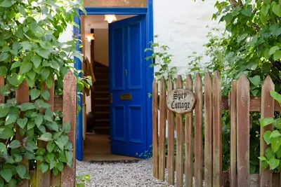 Image de Sleeps 8 in 2 double beds, 1 twin and 1 single bedroom with extra single bed available