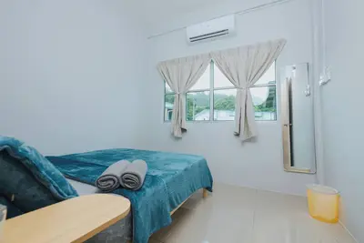 Image de Lot 16 3-bedroom house in peaceful Ranau with WiFi, Ac. Enjoy your stay