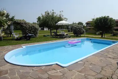 Image de Bel appartement avec piscine, climatisation, Wifi, Tv, terrasse, animaux admis et parking