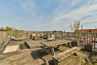 Image de Canal-View Apartment with Large Rooftop Terrace
