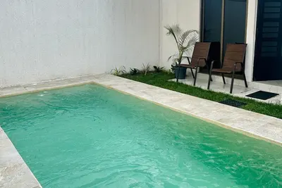 Image de House with Pool in the City ideal for Vacation and Relaxation