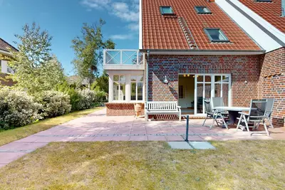 Image de 'Oostertuun' vacation home in a quiet side street on the outskirts of Langeoog
