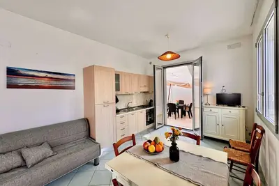 Image de Maison en bord de mer avec jardin et véranda