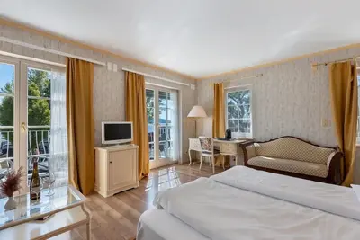 Image de Chambre 'Mit Seeblick Und Balkon' avec vue sur lac, terrasse partagée et Wi-Fi