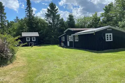 Image de A cozy older summerhouse on a small island