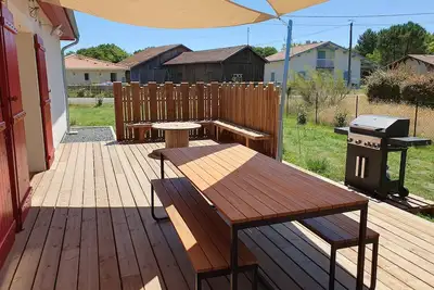 Image de Maison de vacances ensoleillée. Idéalement située entre lac, plage et forêt.