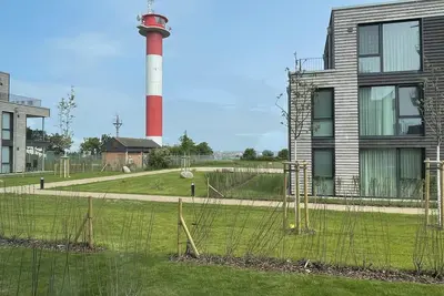 BeltBlick 14- Modern vacation apartment right on the beach with sauna and garden!