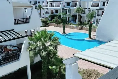 Image de Apprt une Chambre salon vue sur piscines