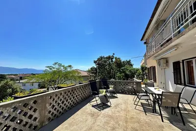 Image de Apartment Andjelka - with sea view, spacious terrace, two bedrooms, washing machine, pet-friendly, private parking