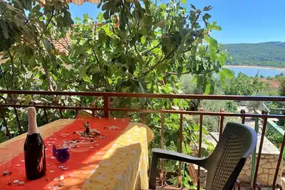 Image de Apartment Santic - sea view, 450 m from sea, balcony, washing machine, pet-friendly