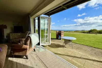 Image de Len's Sandy Collection - 3 Cottages that sleeps 16 guests in 8 bedrooms