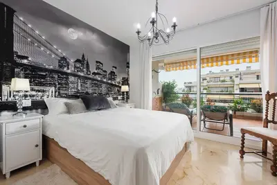 Image de Appartement 'Familiar Guadalmina' avec piscine partagée, Wi-Fi et climatisation