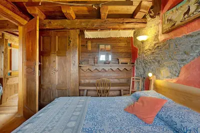 Image de Chambre 'Camoscio' – Espace et confort avec balcon et vue sur les Alpes
