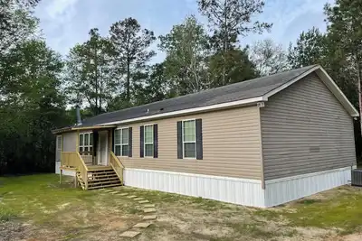 Image de Charming 4-bedroom mobile home with WiFi, Ac in Sun. Near tubing, river