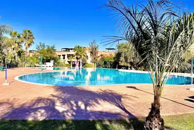 Duplex Luxe avec Rooftop, Piscines & 2 Chambres – Atlas Golf Marrakech